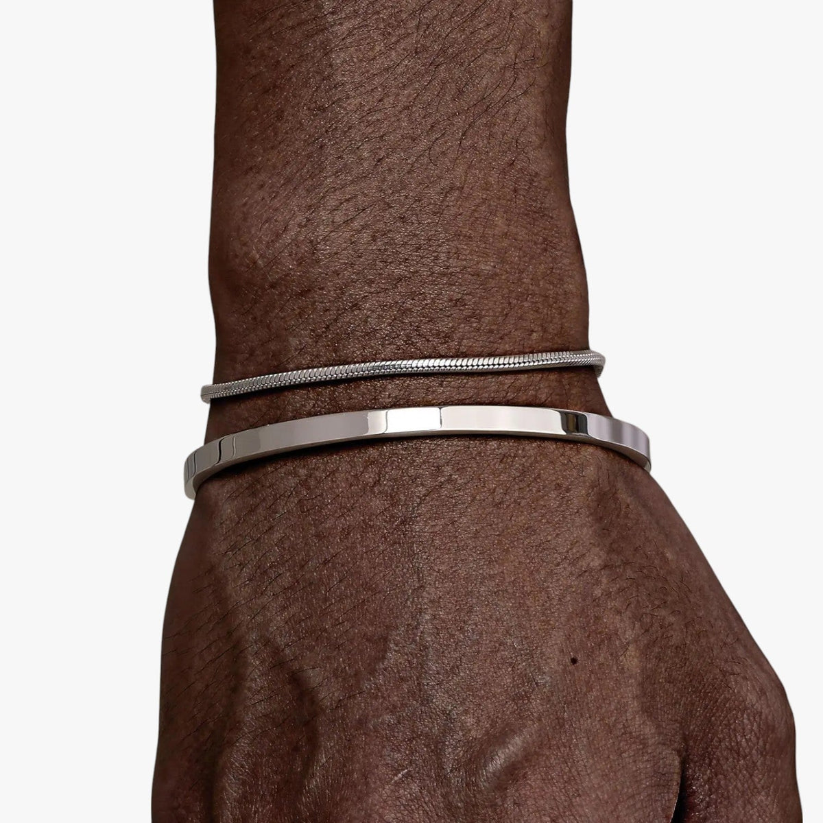 Set stalen schakelarmbanden met mat zwarte details