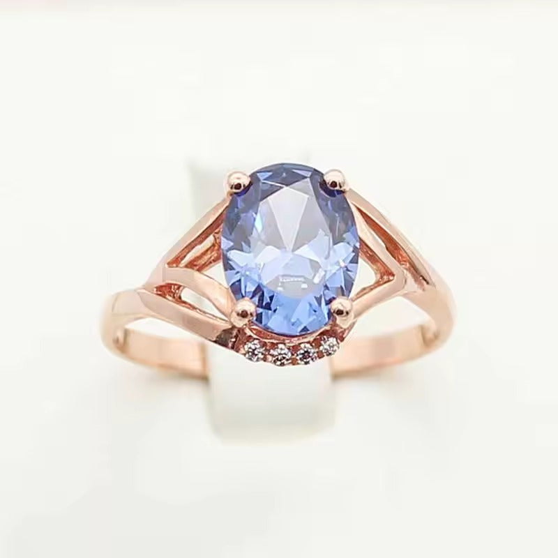 Oval Blue Crystal Ring with Rose Gold-Tone Split Band