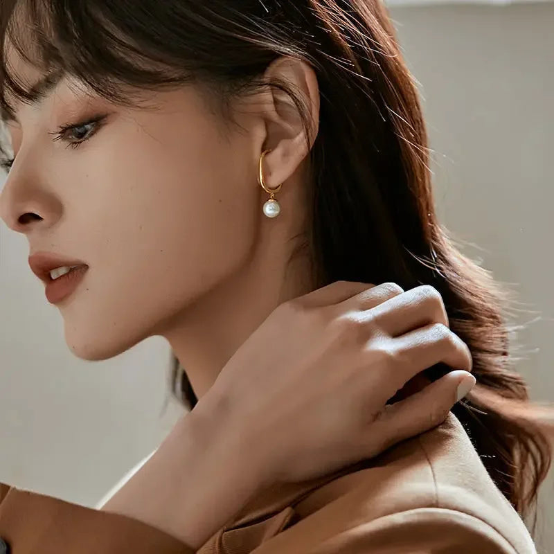 Organische earcuff met parel