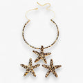 Set met zeesterketting en oorbellen in luipaardprint