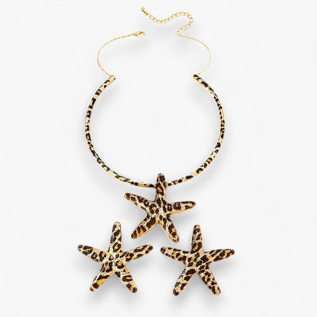 Set met zeesterketting en oorbellen in luipaardprint
