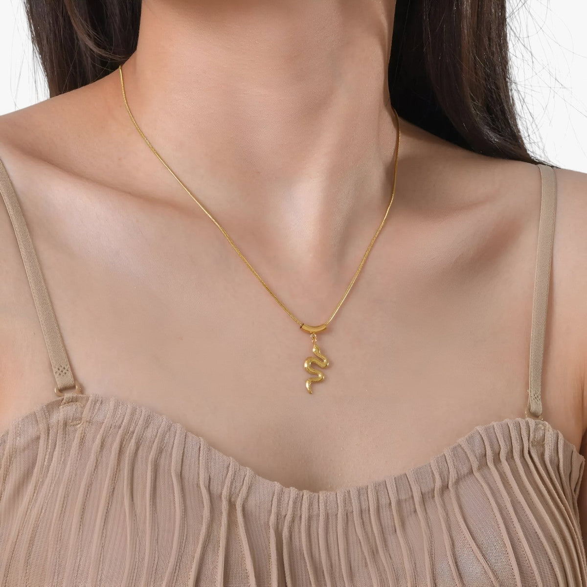 Goudkleurige slangenketting met vintage afwerking