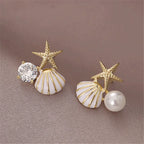 Zeesteroorbellen met schelp- of pareldetail