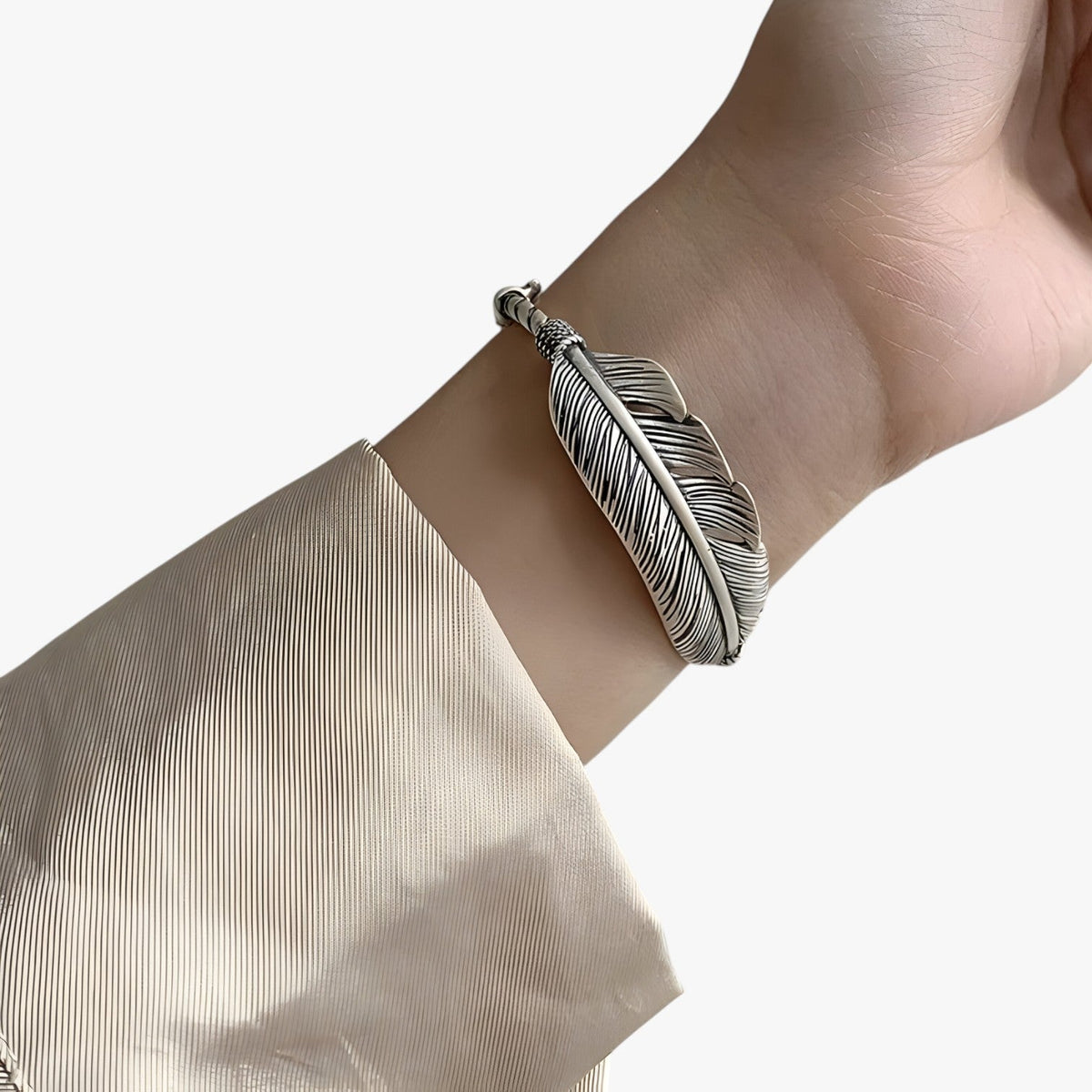 Sterling Silver Bracelet with Gold-Tone Feather Charm