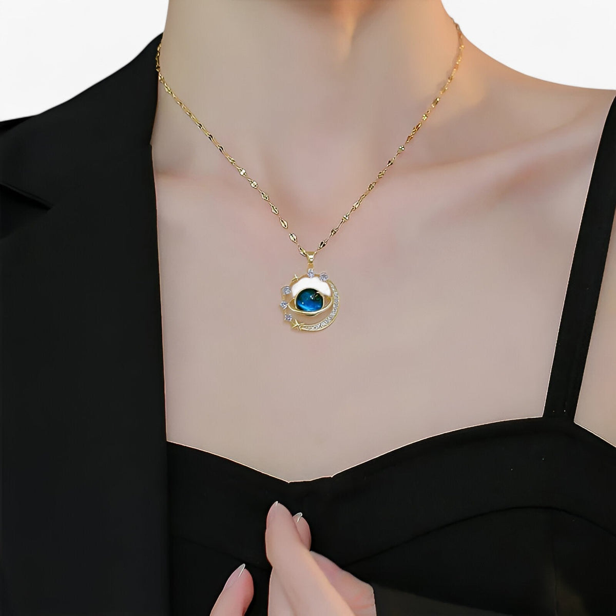 Vergulde choker met kristallen sterren en planeten