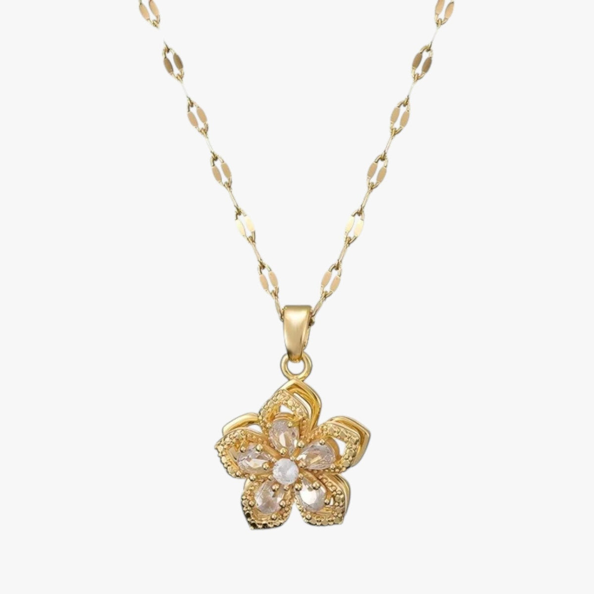 Goudkleurige ketting met ring en draaiende zirkonia bloem