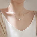 Ketting met klimmende kat in zilverkleur