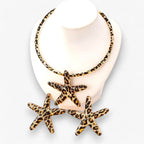 Set met zeesterketting en oorbellen in luipaardprint
