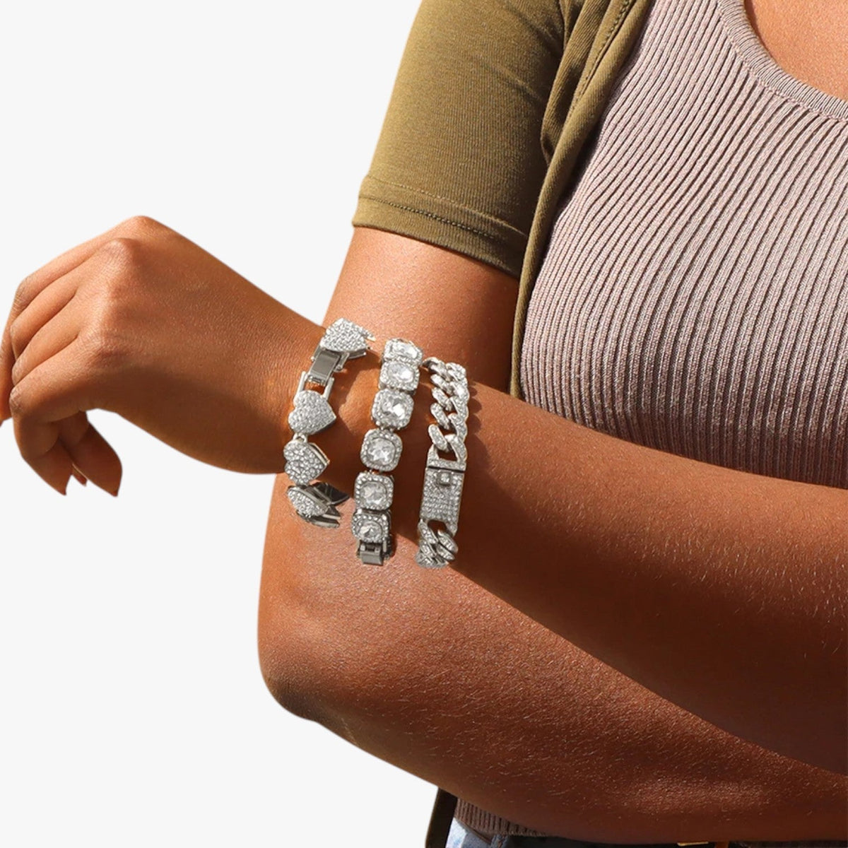Kristallen tennisarmband met hangende hartbedels