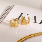 Blomster-ear cuff i guldfarve