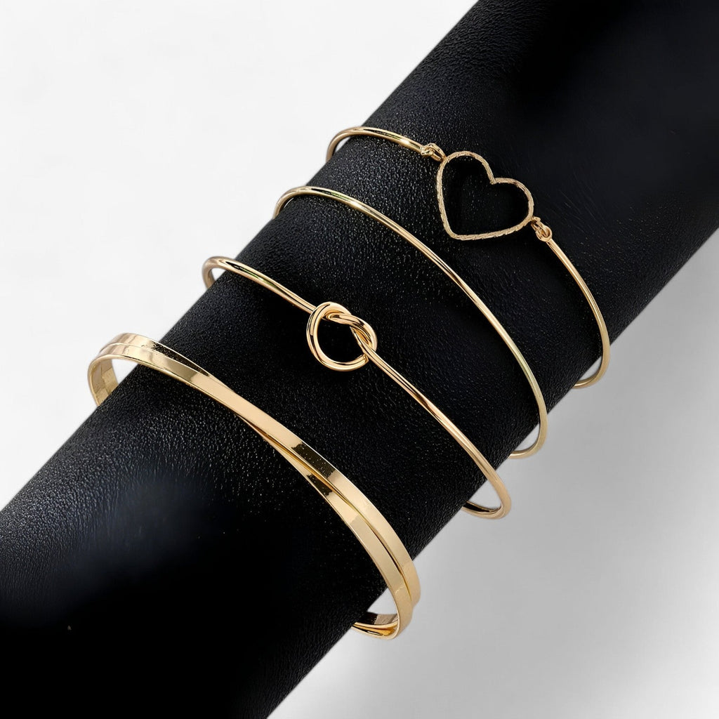 Set ineengevlochten stalen armbanden, goudkleurig