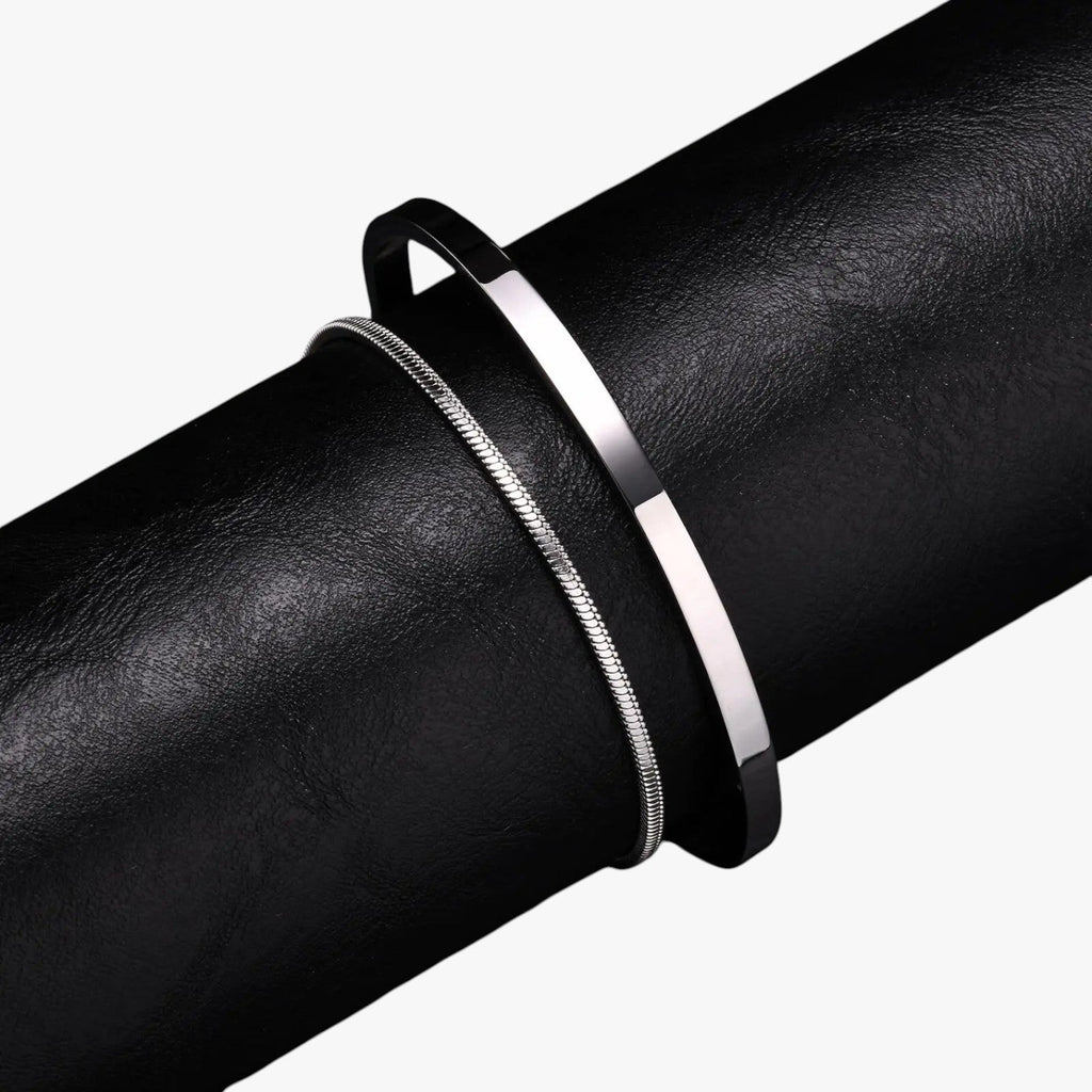 Set stalen schakelarmbanden met mat zwarte details