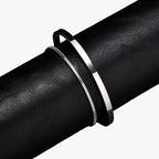 Set stalen schakelarmbanden met mat zwarte details