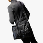Zwarte PU-leren laptopschoudertas voor werk en reizen