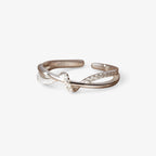 Sterling zilveren ring met knoop en kruis