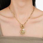 Ketting met bloemhanger en blauwe zirkoniastenen