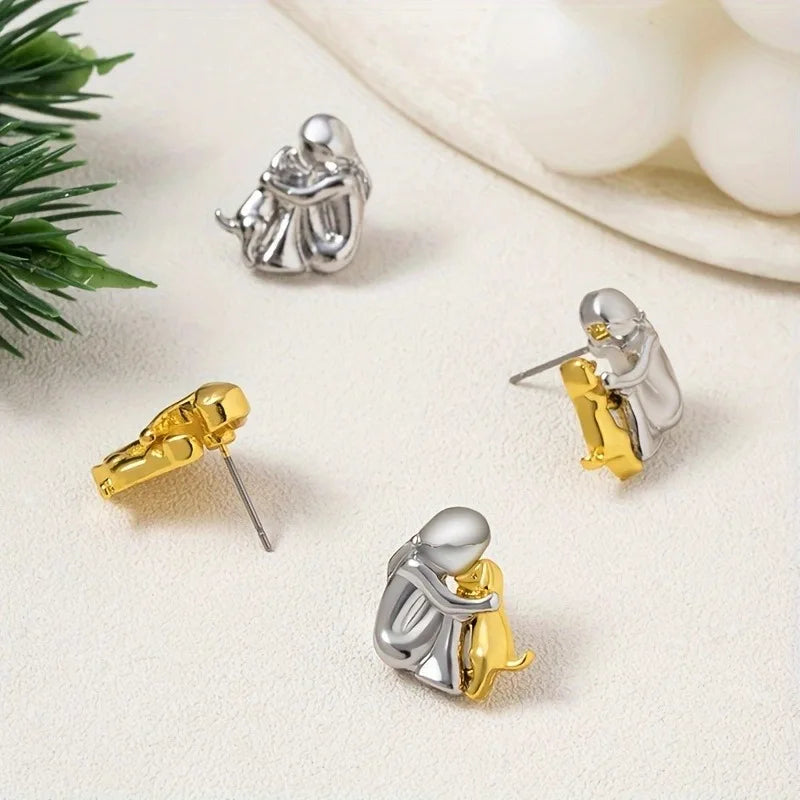 Hug Earrings in Three Metal Finishes