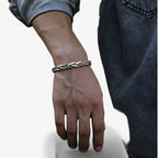 Gedraaide geweven armband in zilverkleur