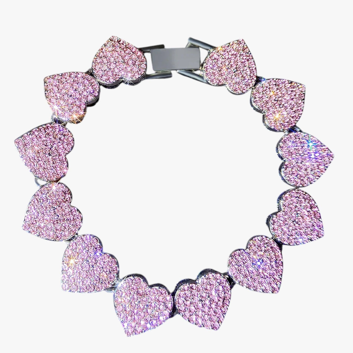Kristallen tennisarmband met hangende hartbedels