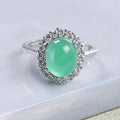 Ring met groene opaallook in zilverkleur