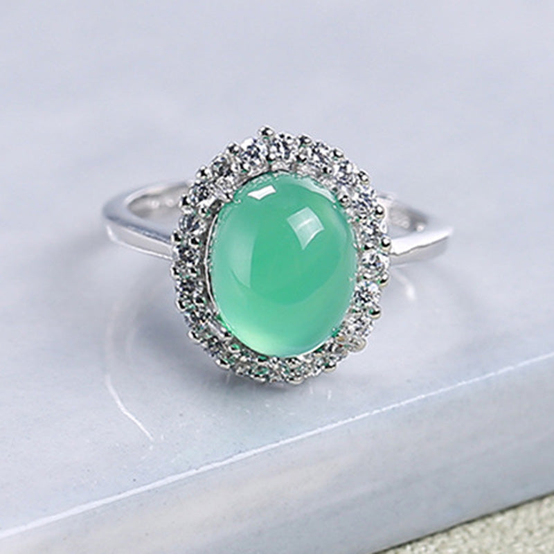 Ring met groene opaallook in zilverkleur