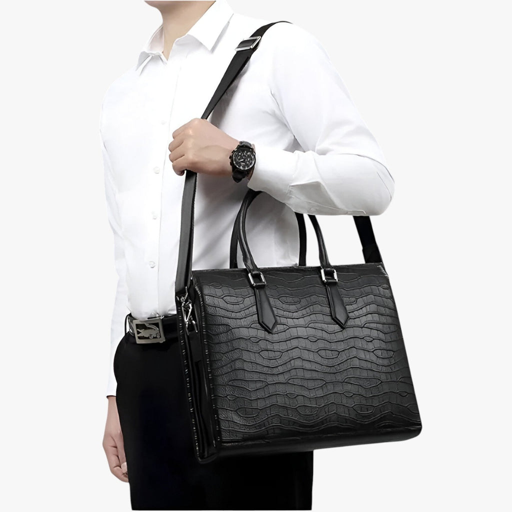 High-Capacity Black Leather Travel Bag with Laptop Compartment