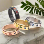 Stainless Steel Spinning Paw Fidget Ring with Rainbow Paws
