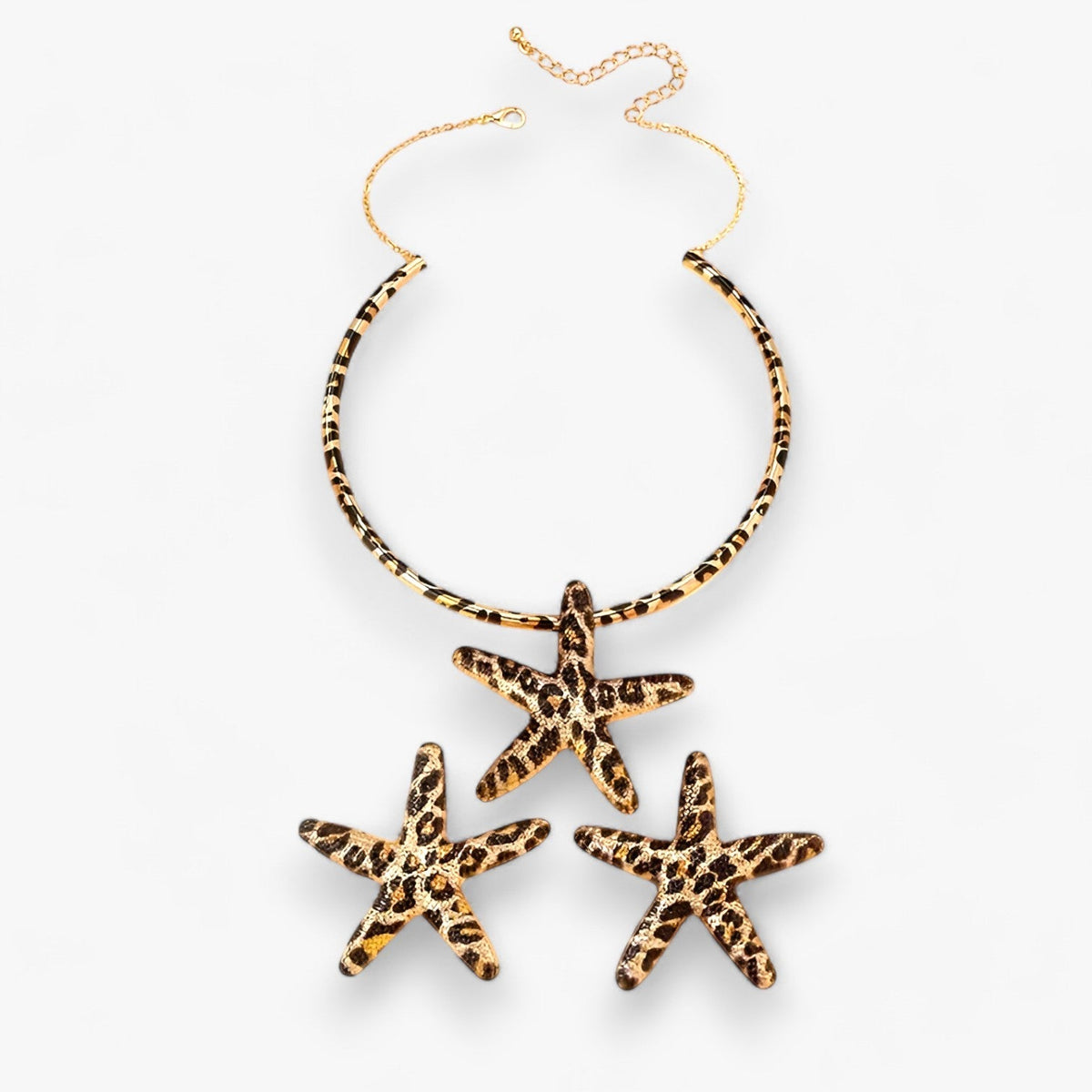 Set met zeesterketting en oorbellen in luipaardprint