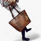 Simple Elegant Leather Handbag with Tassel Detail