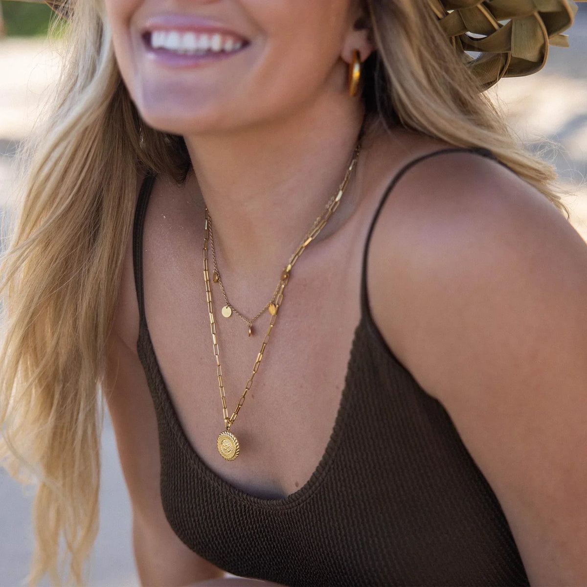 Ketting met boeddhahanger in twee metaalkleuren