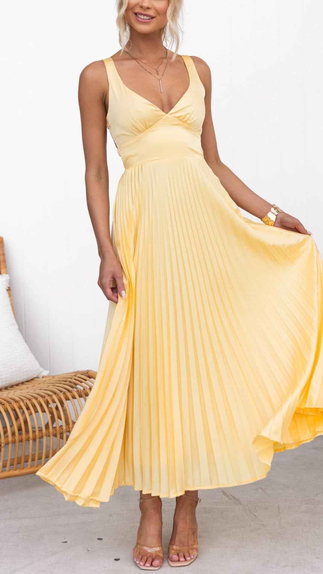 Geplooide maxi-jurk met diepe V-hals en zachte beweging