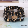 Onyx and Gold-Tone Tree of Life Bracelet