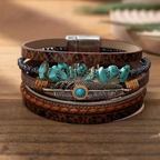 Turquoise wikkelarmband met veerbedel