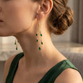 Lange oorhangers met ketting en groene steen