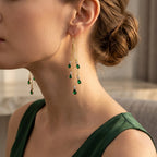 Lange oorhangers met ketting en groene steen