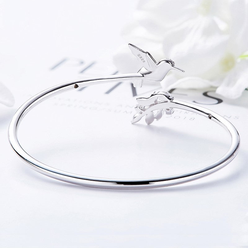 Adjustable Hummingbird and Flower Ring with Rhinestones