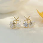 Zeesteroorbellen met schelp- of pareldetail