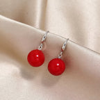 Ovale oorbellen met druppelhanger
