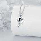 Ketting met zwarte pootafdrukhanger
