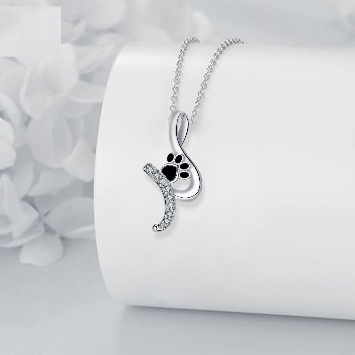 Ketting met zwarte pootafdrukhanger