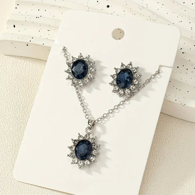 Set van haloketting en oorbellen met blauwe ovale steen