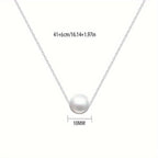 Witgoudkleurige ketting met witte imitatieparel als hanger
