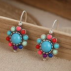 Bloemenoorhangers met turkoois en koraallook