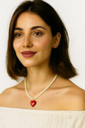 Ketting met harthanger aan kralenschakel met parellook