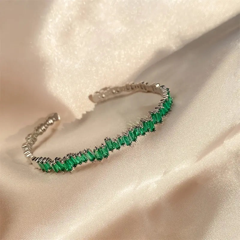 Green Stone Row Bangle in White Gold Tone