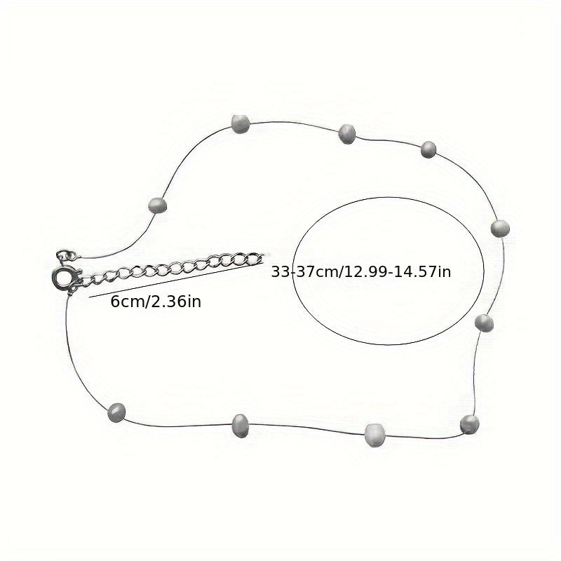 Minimalistische witte parelketting