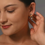 Goudkleurige oorknopjes met vierkante turquoise steen