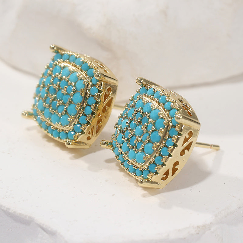 Vierkante oorknopjes van synthetisch turquoise