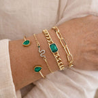 Pakket kristalarmbanden in groen met goudkleurige details
