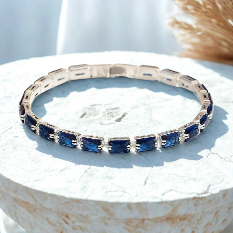 Blue Stone Tennis Bracelet in Silver Tone